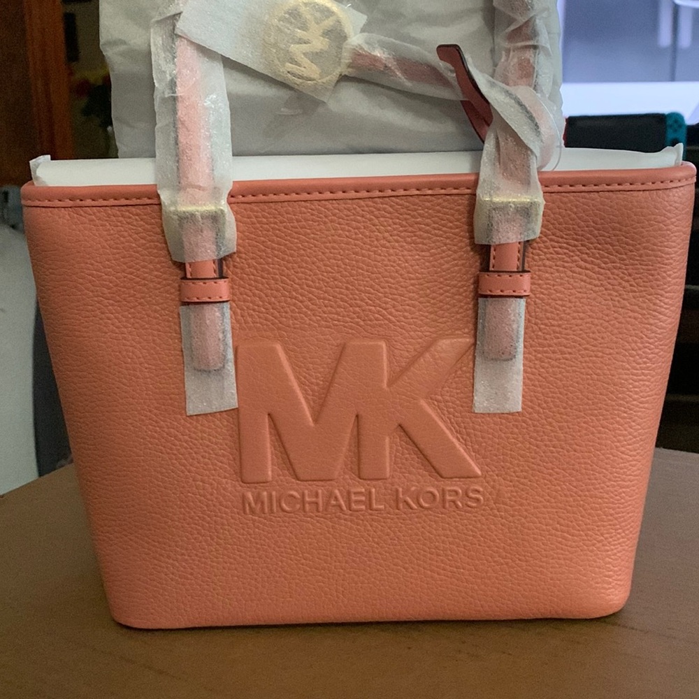 Michael Kors embossed emblem pebbled leather tote